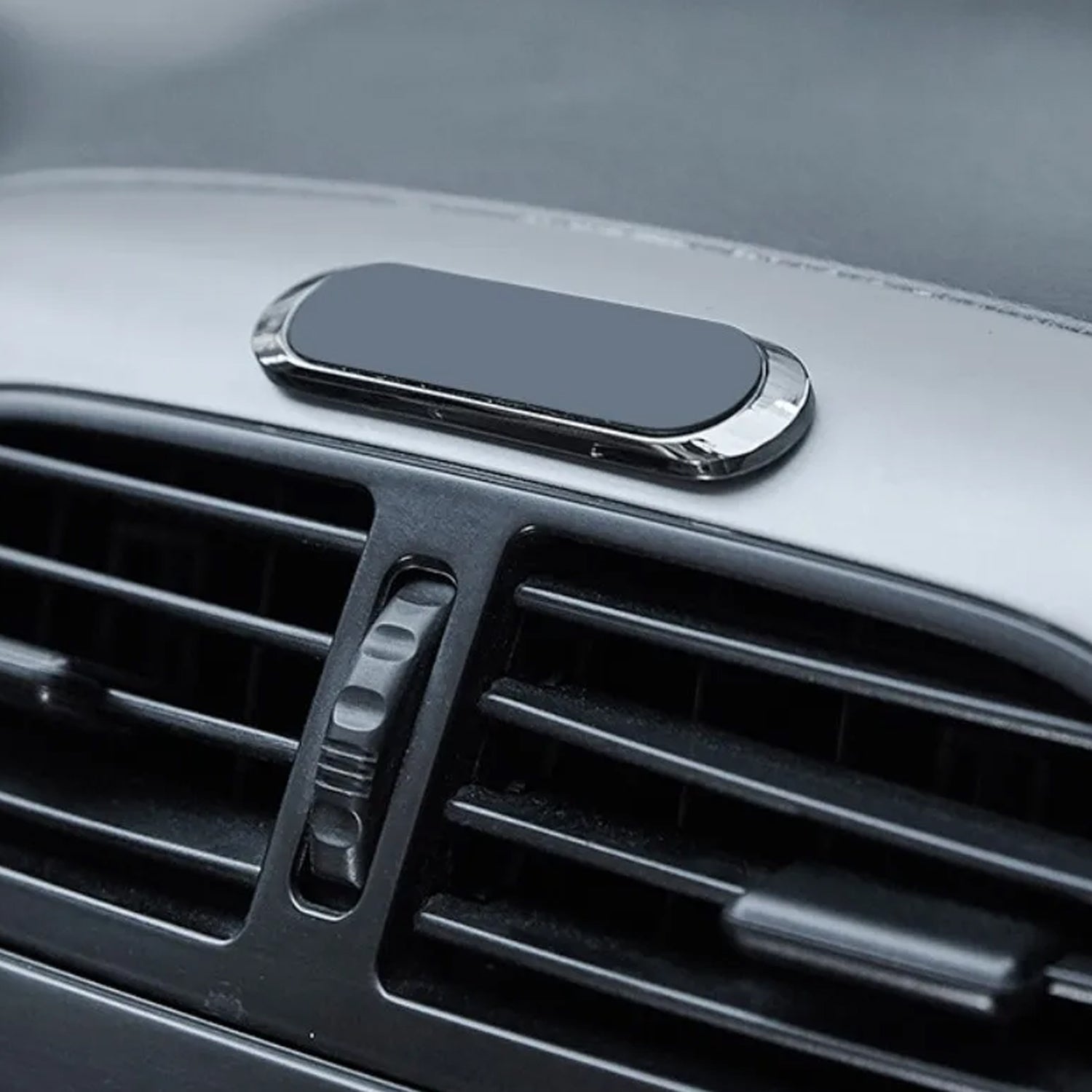 Durable car dashboard phone holder with rotation feature. Durable car dashboard phone holder with rotation feature.